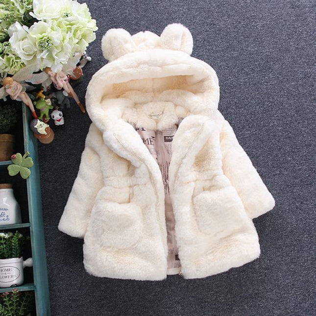 A Girl's Fur Coat for Autumn and Winter